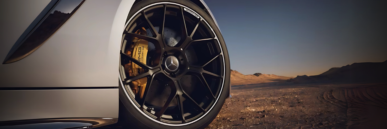 A close up photo of a wheel with a black multi-spoke forged alloy on a Mercedes-AMG GLC 63 S
