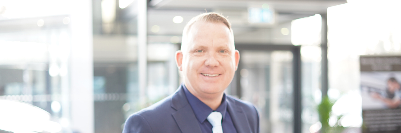 A headshot of Craig Douglas