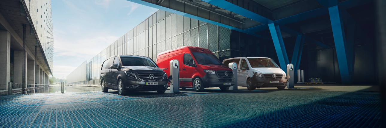 A dusty blue Mercedes-Benz eSprinter