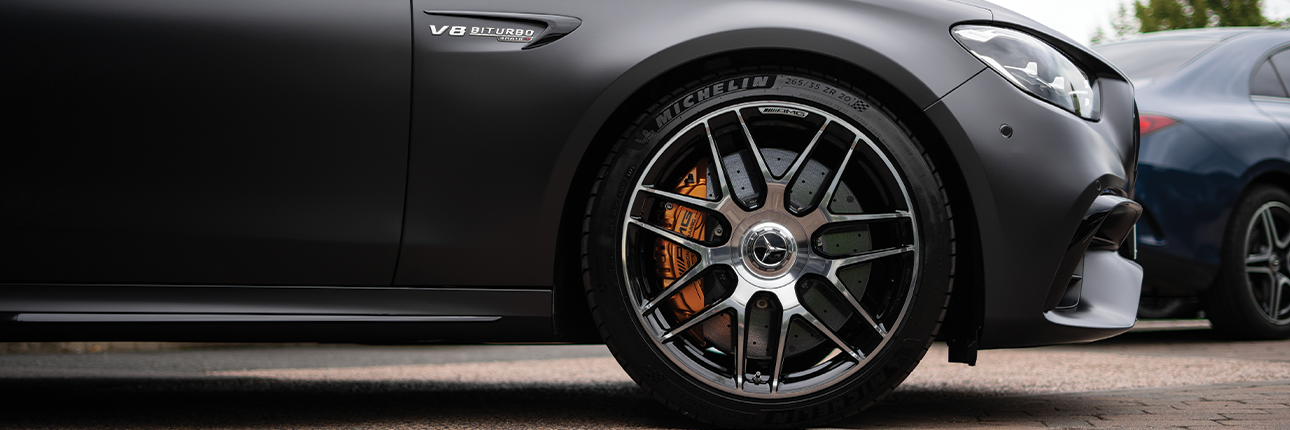 A close up photo of a wheel with a black multi-spoke forged alloy on a Mercedes-AMG GLC 63 S
