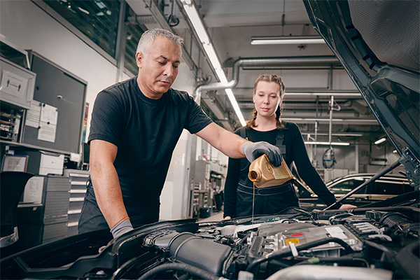 Mercedes-Benz Technician fixing car brakes